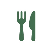 A green icon of a fork and knife placed side by side on a white circular background.